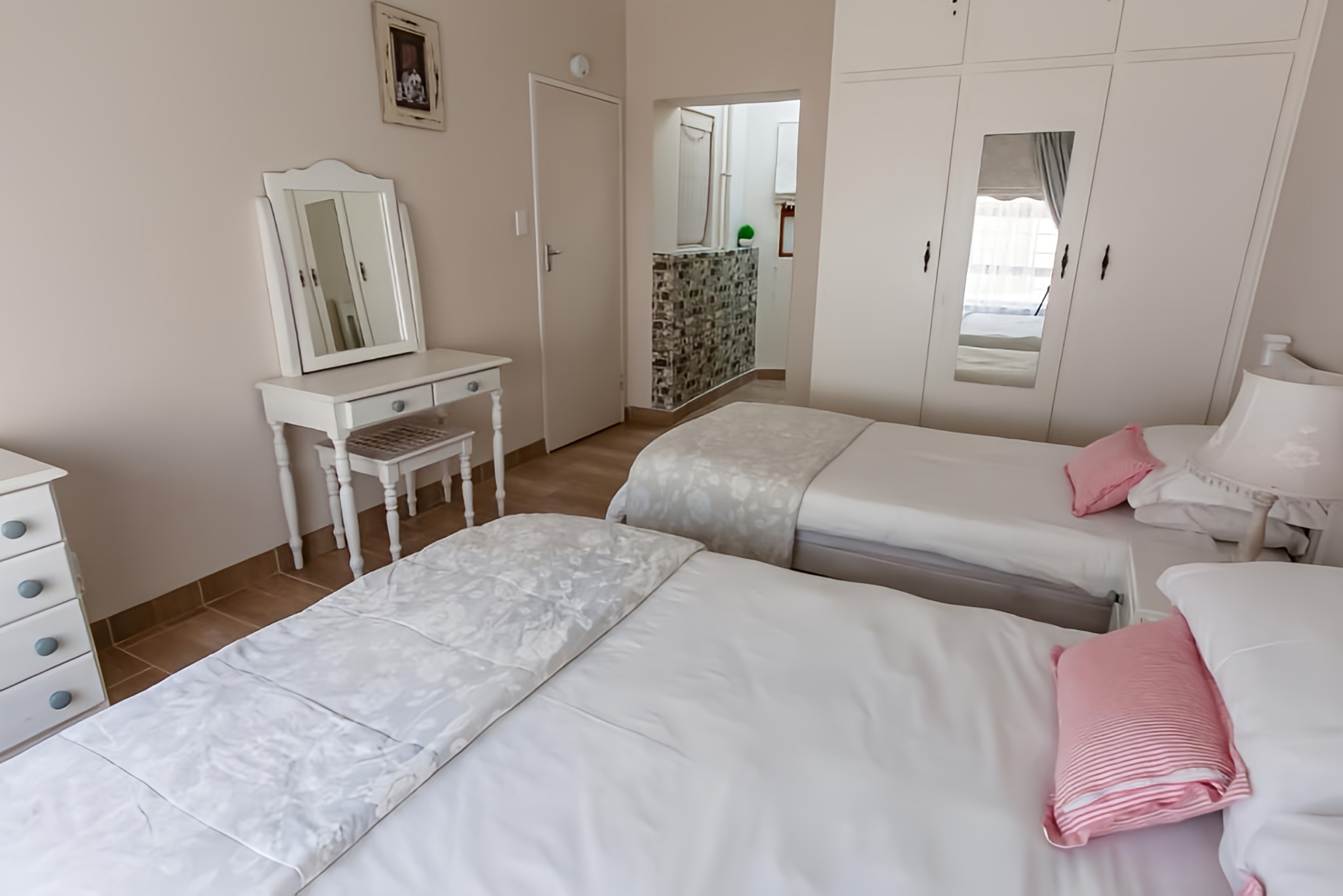 Main bedroom beds at Surf n Sea 3 bedroom holiday home Jeffreys Bay